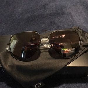 Brand new never worn Oakley sunglasses